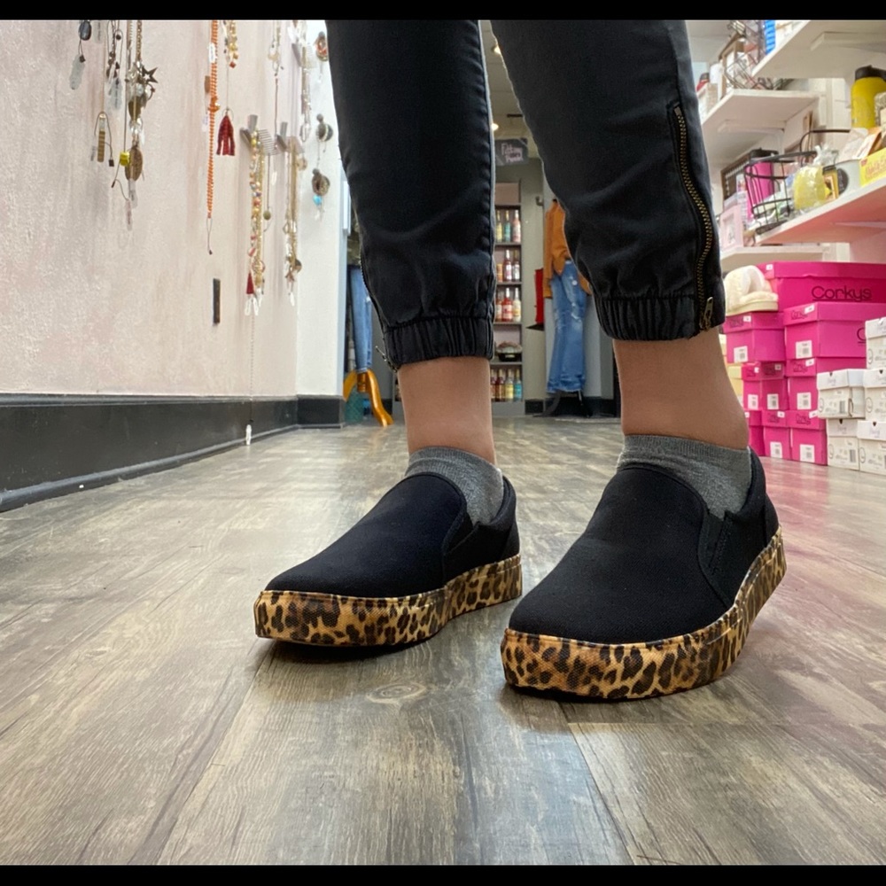 Black slip on sneakers